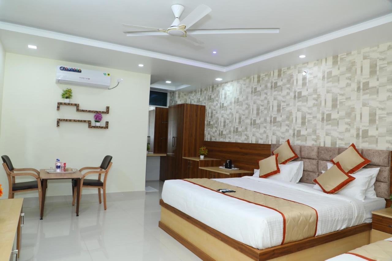 Hotel 8Th Mile Suites Bangalore Exterior photo